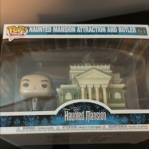 Haunted Mansion Attraction and Butler Vinyl Figure